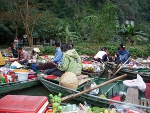 Boats-and-traders-at-floating-market-1-Ninh-Binh-Vietnam.JPG