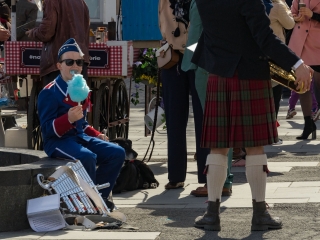 Boy-in-traditional-outfit-eating-candy-floss-Constitution-Day-Tromsø-Norway