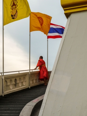 Buddhist-Monk-on-steps-of-Wat-Saket-Bangkok-Thailand