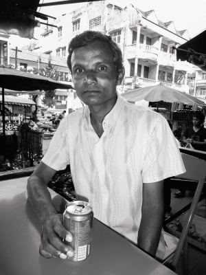 Burmese-man-drinking-coke-Tachilek-Burma
