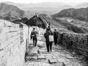 Four-labourers-walking-on-the-Great-Wall-of-China