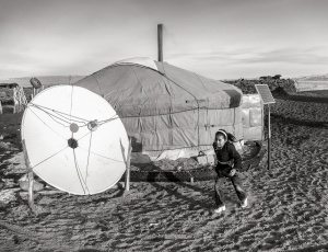 Girl-running-outside-ger-Gobi-Desert-Mongolia