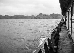 Man-on-ferry-to-Cat-Ba-Island-Vietnam-