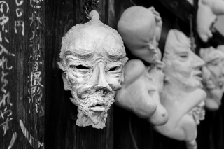 Masks-hanging-on-wall-Kyoto-Japan