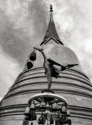 Phoenix-in-front-of-bell-tower-Wat-Saket-Bangkok-Thailand
