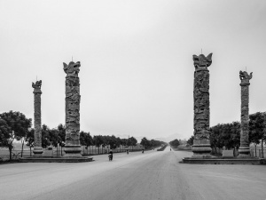 Stone-columns-in-road-scene-Ninh-Binh-Vietnam