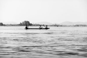 Three-boys-in-canoe-Mekong-River-4000-Islands-Laos