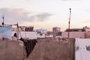Veiled-woman-on-the-rooftops-of-Essaouira-Morocco